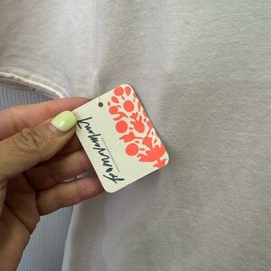 FP Movement by Free People Pale Pink Jumpsuit with Floral Tag Detail